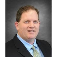 Chris Wambach at CrossCountry Mortgage - Originating Branch Manager | NMLS #334814 in Anoka, MN